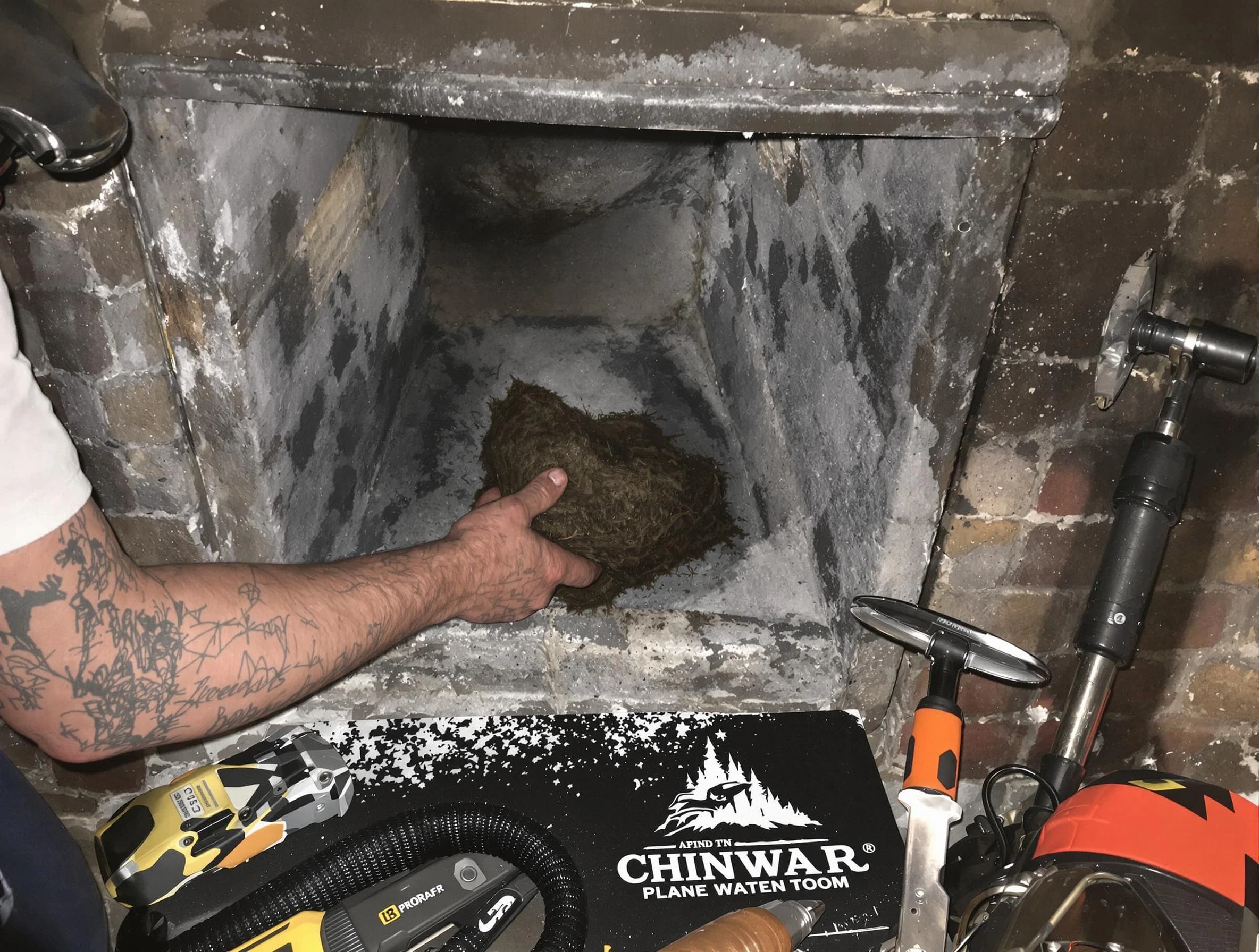 Adamsville Chimney Sweep safely removing debris and screening chimney in Adamsville, AL