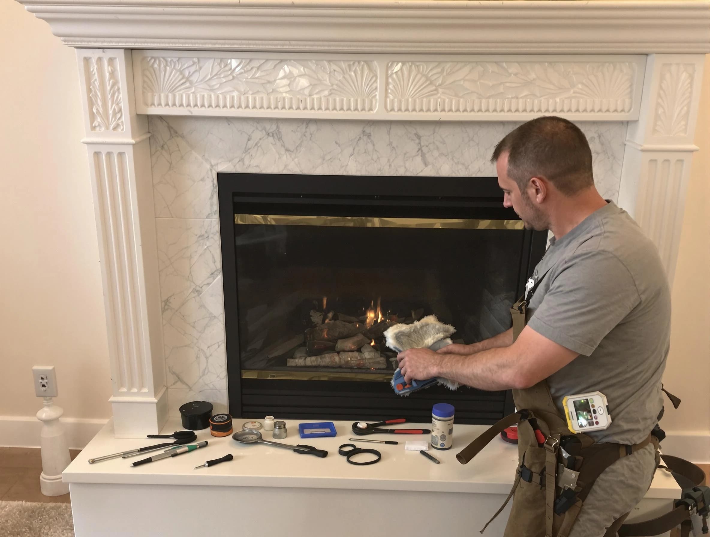 Adamsville Chimney Sweep performing fireplace maintenance in Adamsville, AL
